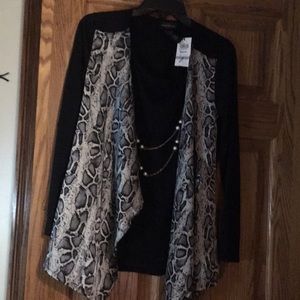 Women’s black layered blouse. Animal print